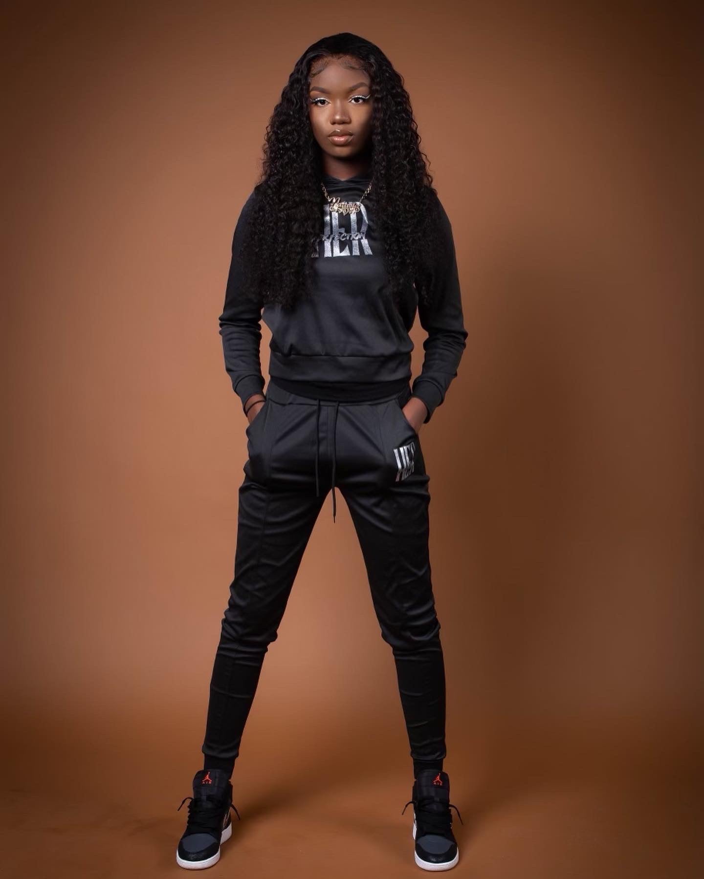 Black “HER” tracksuit